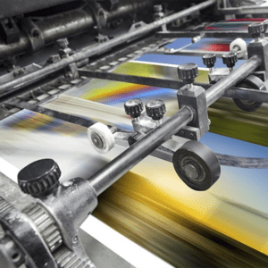 máquina offset imprimiendo